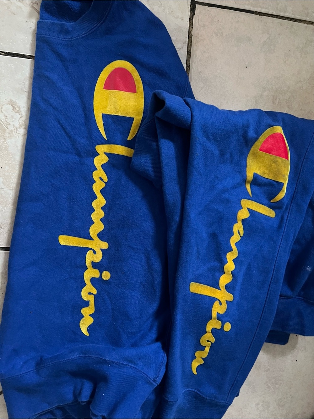 Champion Royal Blue Sweatsuit with Yellow Script and Red Accents